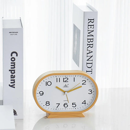 Owalny budzik analogowy w stylu retro