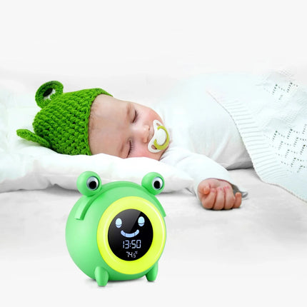 Zielony budzik żabka trener snu