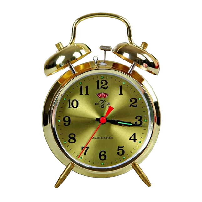 Złoty mechaniczny budzik w stylu vintage