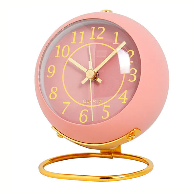 Różowy okrągły budzik w stylu vintage